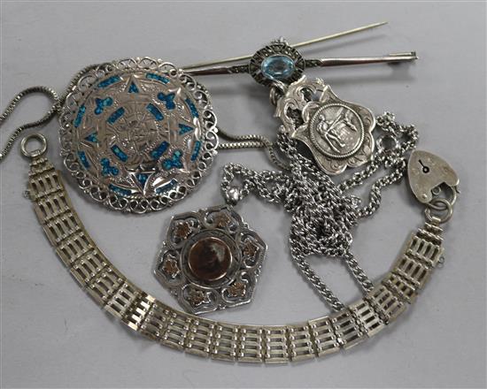 A group of silver jewellery.